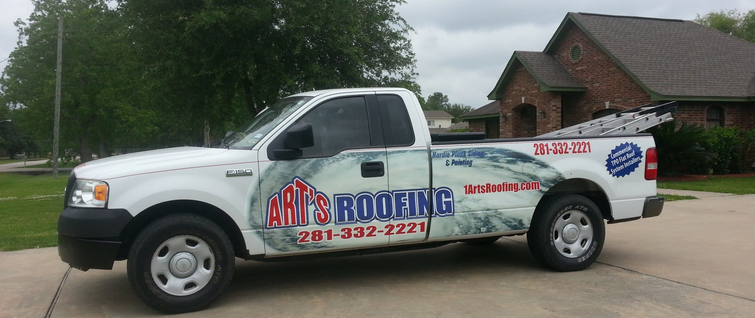 Art's roofing truck